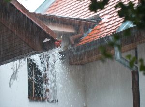 House in the rain after being painted.