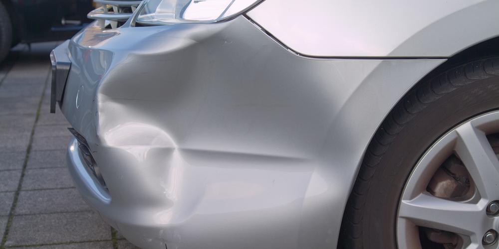 Dent Repair: 5 Common Causes of Car Dents - Coach Auto Body