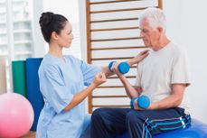 Physical therapy is used to strengthen the joint's surrounding muscles.