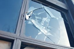 broken window Woodburn OR