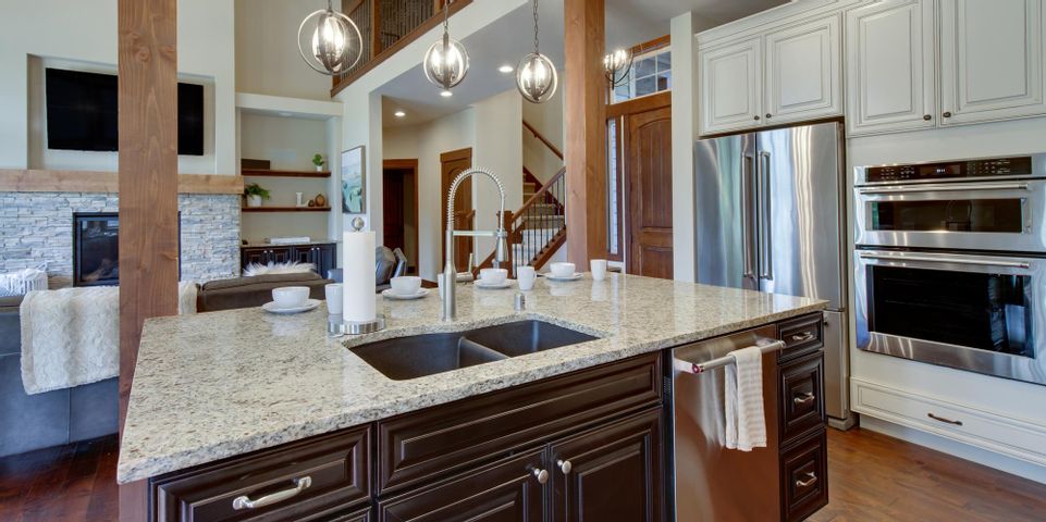 3 Reasons to Add an Island to Your Kitchen Design - Tremain Corporation