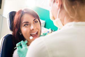 Cavities / https://depositphotos.com/43750185/stock-photo-ready-for-a-dental-check.html