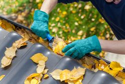 Clogged gutters from leaves and debris