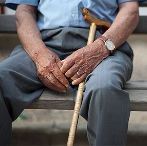 senior citizen with a cane